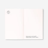 Creative office journal with prompts from Flying Tiger Copenhagen, featuring colorful pages and inspirational writing spaces.