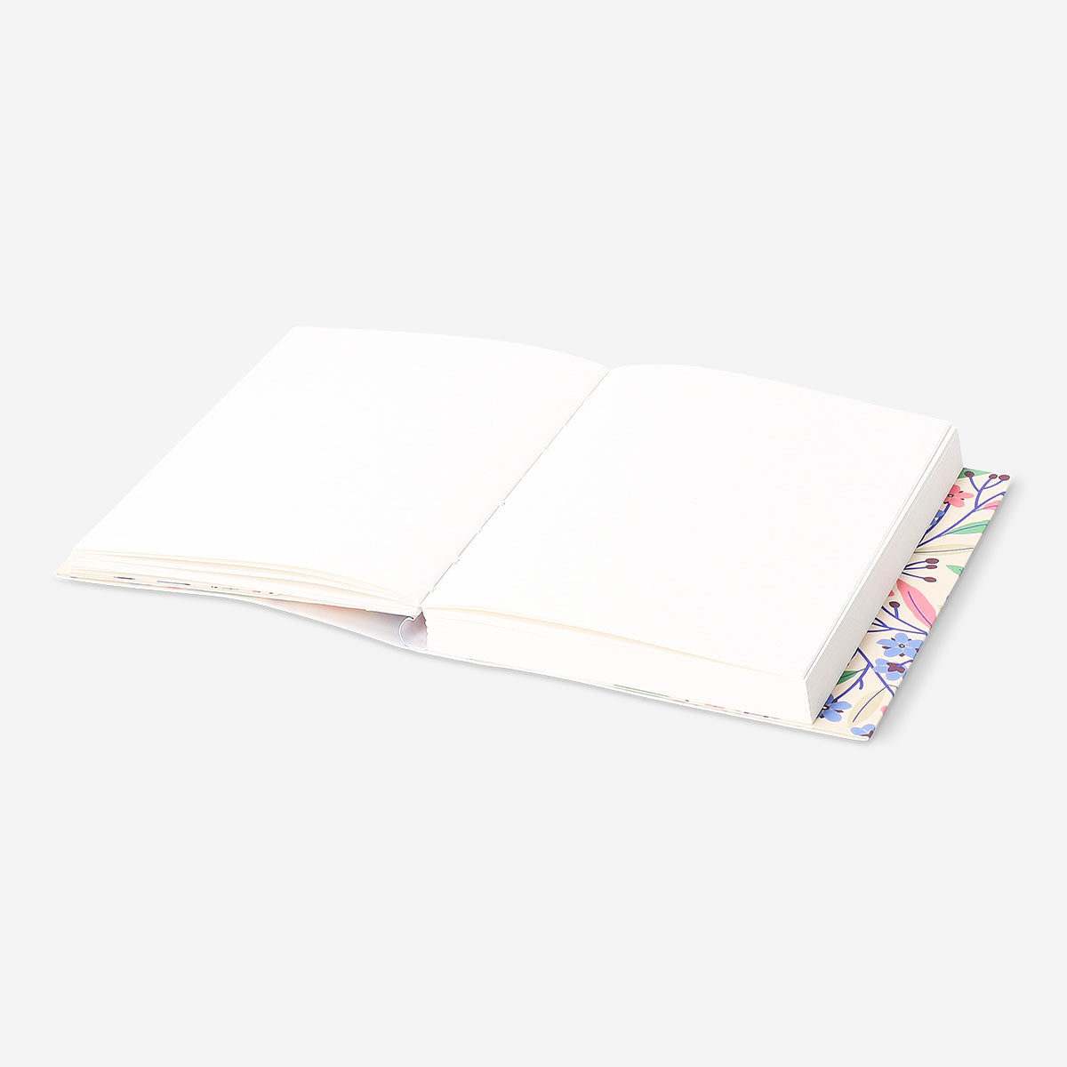 Flying Tiger Copenhagen floral office notebook with colorful floral cover and lined pages for note-taking and organization.
