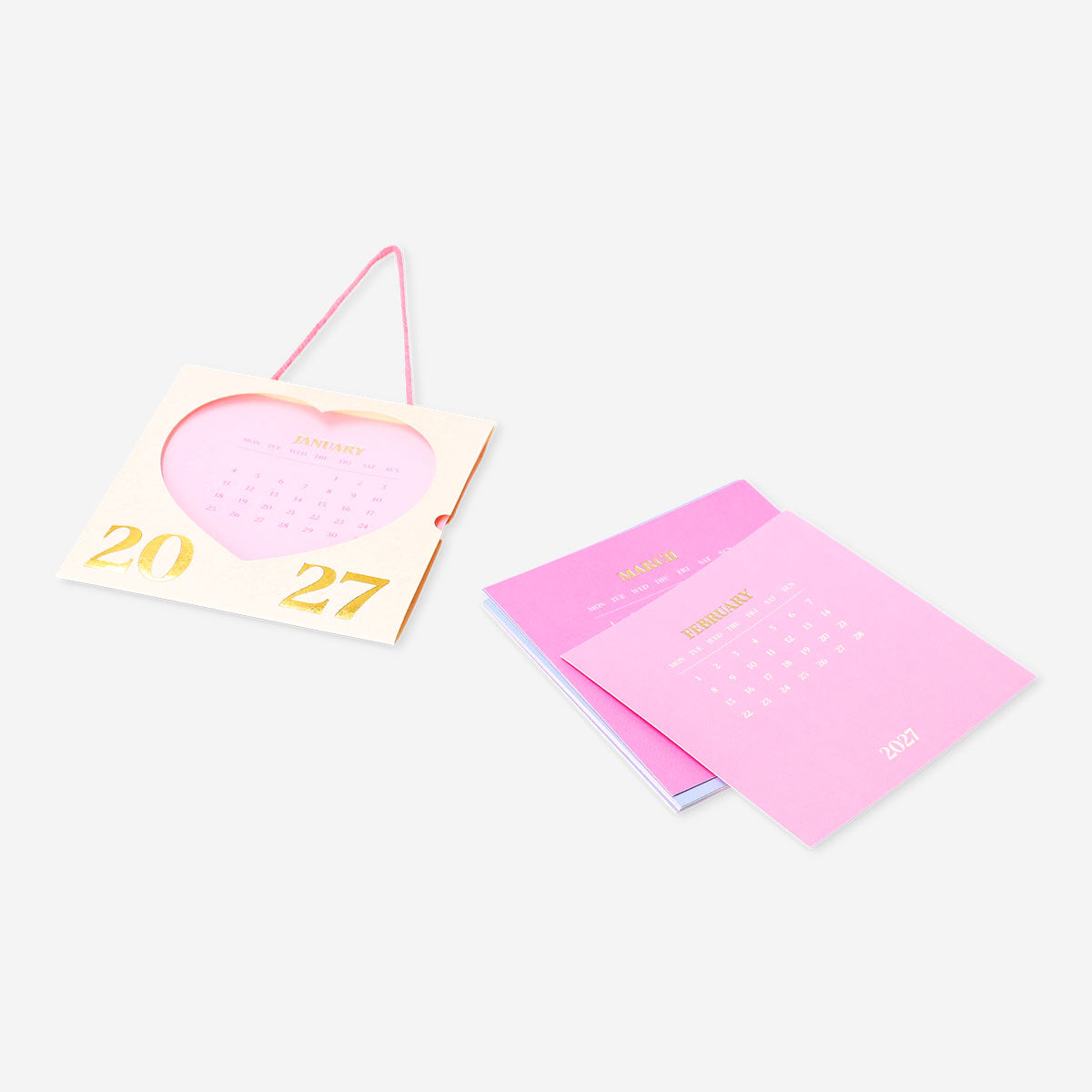 Pink heart design hanging office calendar for 2027 by Flying Tiger Copenhagen showing monthly layout with dates.