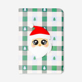 Flying Tiger Copenhagen office notebook featuring a festive Santa design on the cover, ideal for note-taking during the holidays.
