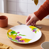 Flying Tiger Copenhagen 21cm autumn print kitchen plate with colorful fall leaf design on ceramic surface.