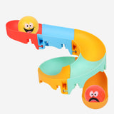 Colorful DIY ball run game by Flying Tiger Copenhagen featuring wooden tracks and balls for creative play and building fun.