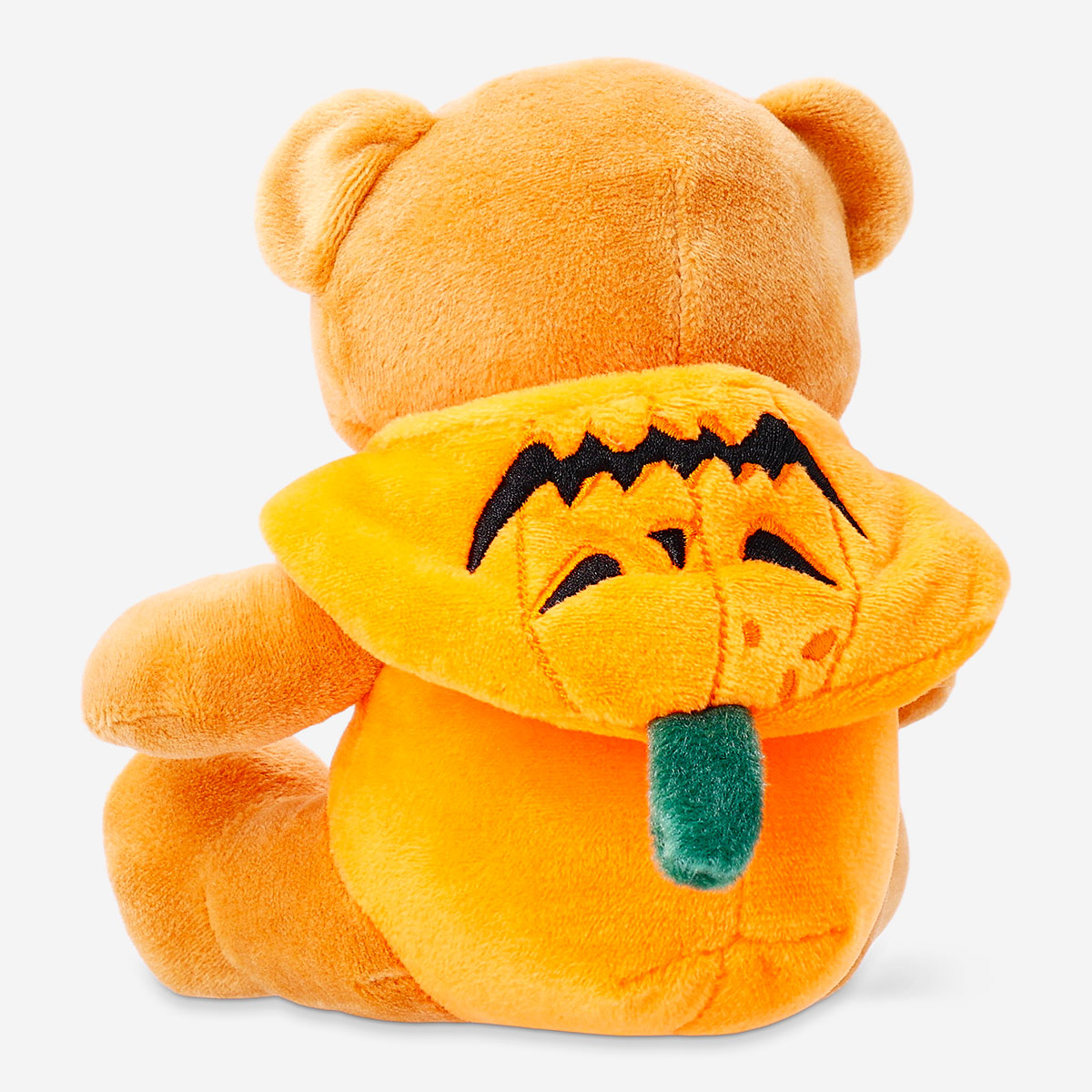 Flying Tiger Copenhagen plush toy teddy bear dressed as a pumpkin, soft fabric with orange and green details, perfect for cuddling.
