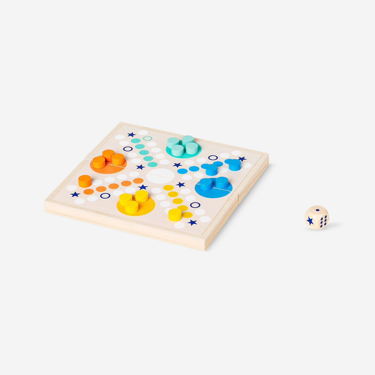 Wooden Ludo game by Flying Tiger Copenhagen with colorful game pieces and board, perfect for family fun and strategic play.