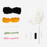 DIY crochet Halloween cat hobby kit by Flying Tiger Copenhagen, featuring colorful yarn and crochet tools for festive craft projects.