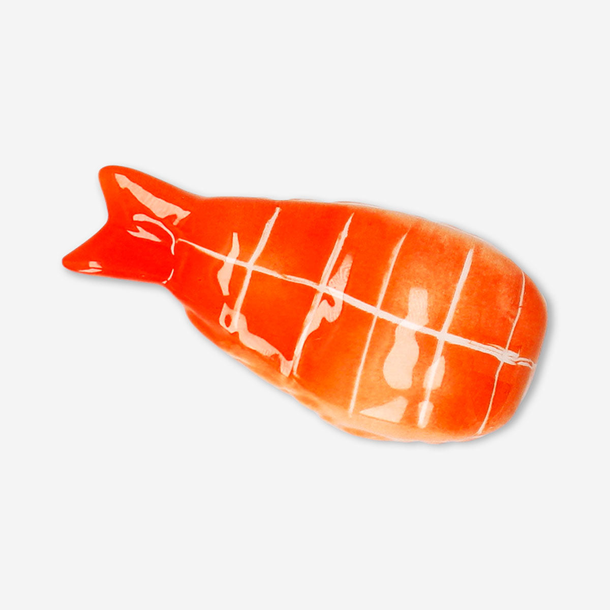 Flying Tiger Copenhagen nigiri prawn chopstick holder, colorful kitchen accessory shaped like a prawn for holding chopsticks.