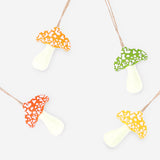 Set of four decorative felt mushrooms for hanging, ideal for party decor, by Flying Tiger Copenhagen.