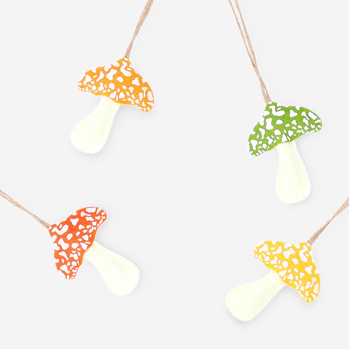 Set of four decorative felt mushrooms for hanging, ideal for party decor, by Flying Tiger Copenhagen.