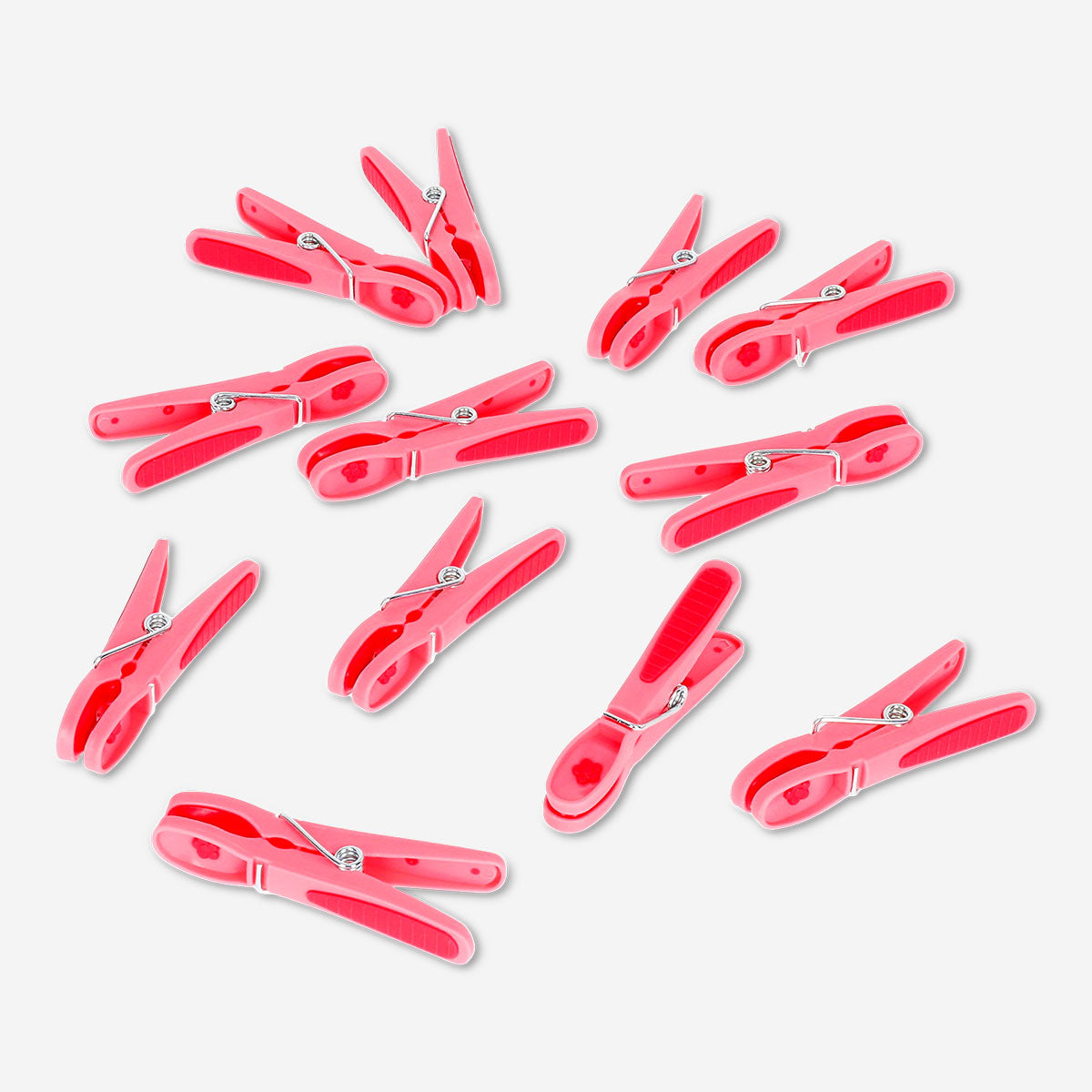 Set of 12 pink flower clothes pegs from Flying Tiger Copenhagen, ideal for hanging laundry or organizing household items.