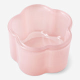 Milky pink glass tealight holder for home decor, featuring a smooth, rounded design from Flying Tiger Copenhagen.