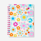 Flying Tiger Copenhagen floral office notebook with page markers and pen, featuring colorful floral cover and organized writing space.