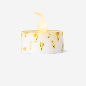 Set of 4 LED tealights with colorful flower print, ideal for home decor, by Flying Tiger Copenhagen.