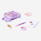 Candy-themed mini backpack stationery kit by Flying Tiger Copenhagen, featuring colorful office supplies in a playful design.