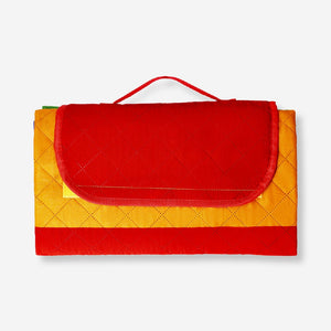 Colorful quilted rainbow picnic blanket with carrying strap, 170x130 cm, ideal for outdoor or home use by Flying Tiger Copenhagen.