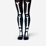 Adult skeleton tights by Flying Tiger Copenhagen featuring black textile with white bone print for Halloween costumes.