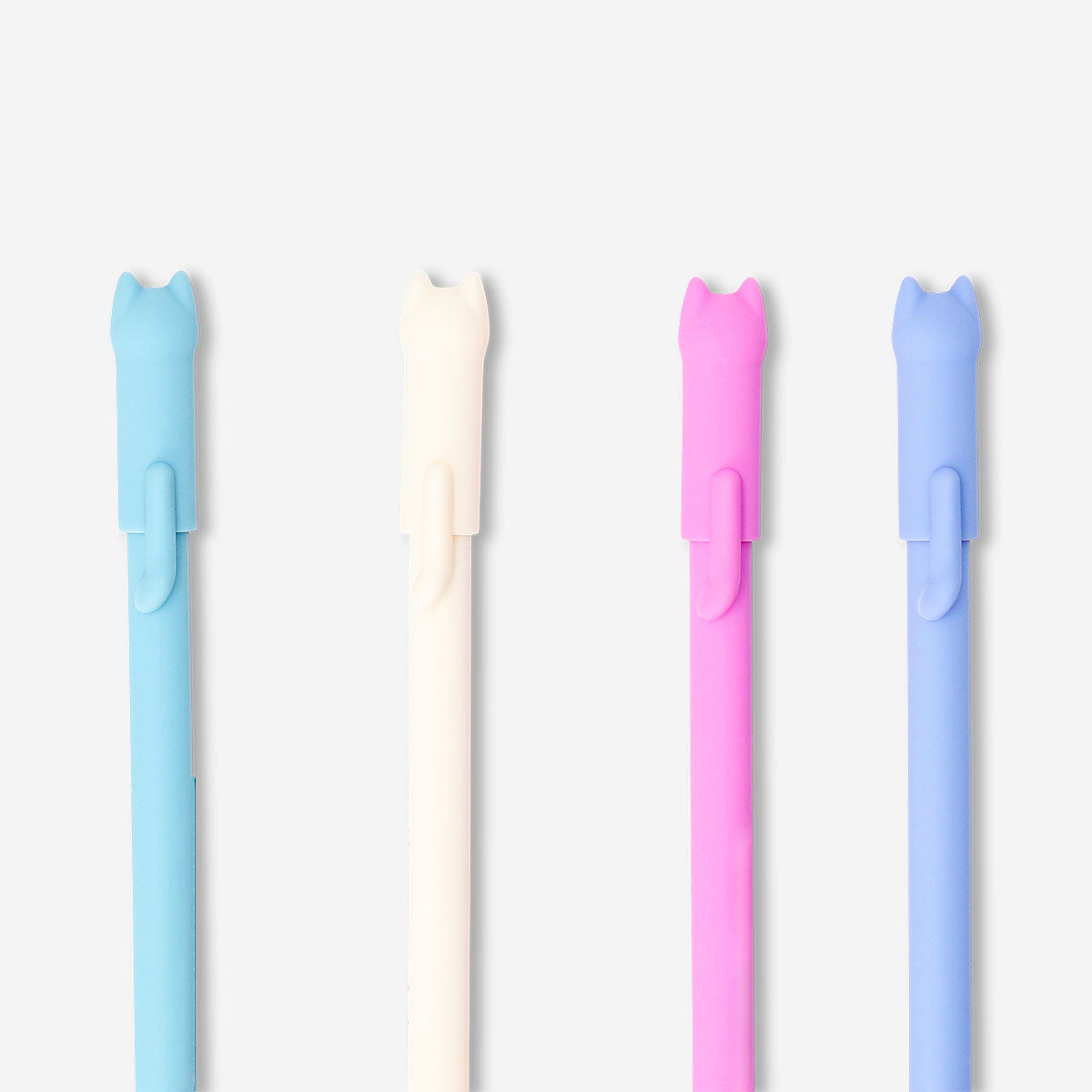 Set of four Flying Tiger Copenhagen ballpoint pens with playful cat toppers, ideal for office or school use.