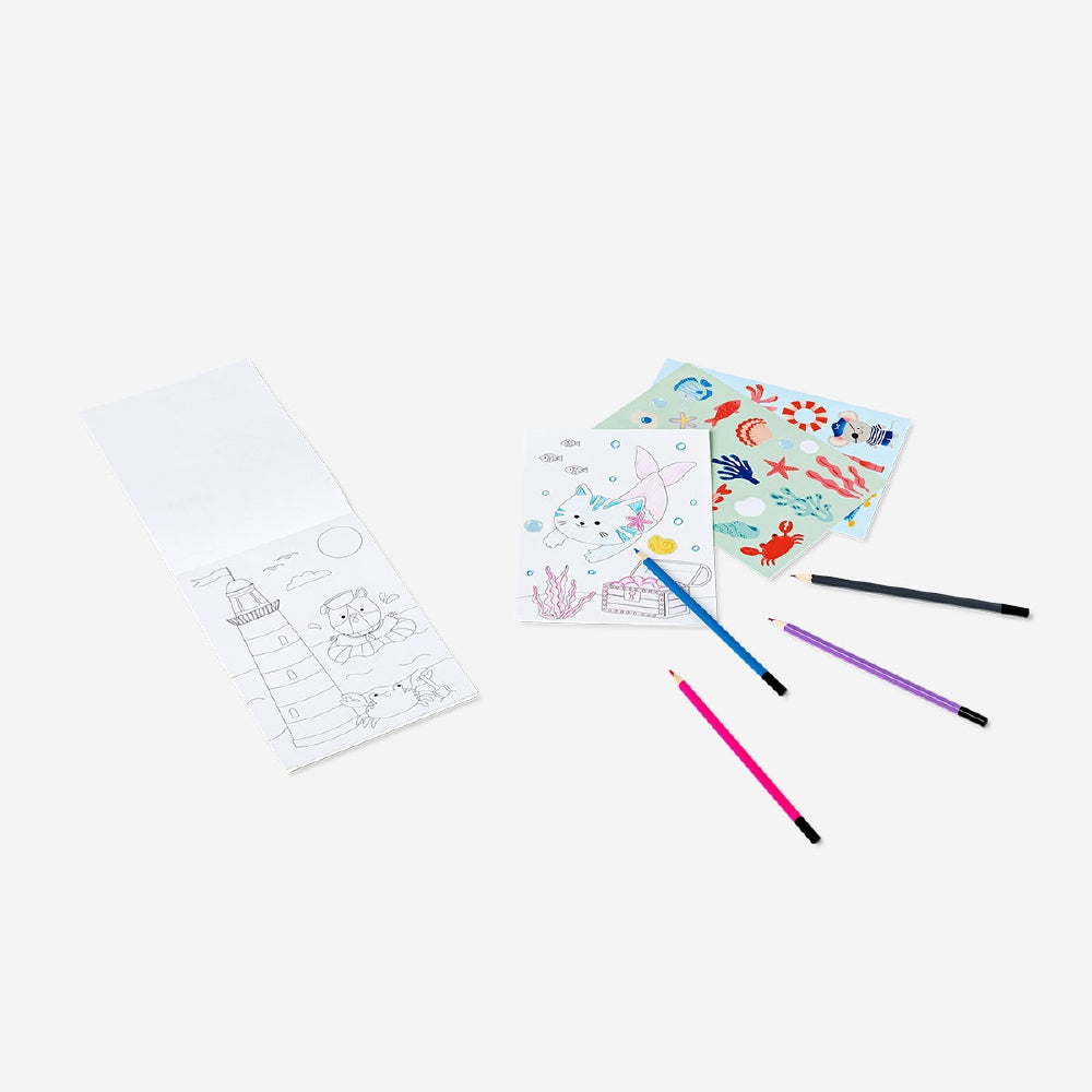 Travel colouring kit in suitcase by Flying Tiger Copenhagen, featuring colored pencils, markers, and coloring pages for on-the-go fun.