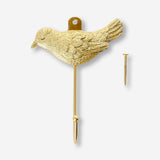 Gold bird hook for home decor by Flying Tiger Copenhagen, featuring a decorative bird design for wall mounting.