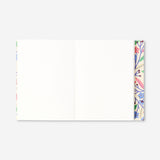 Floral office notebook by Flying Tiger Copenhagen with colorful flower cover, ideal for writing and note-taking.