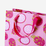 Office gift bag with dragon fruit print, 25x33 cm by Flying Tiger Copenhagen, featuring colorful tropical fruit design.