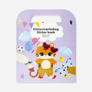 Colorful activity book featuring dress-up stickers from Flying Tiger Copenhagen, perfect for creative play and hobbies.