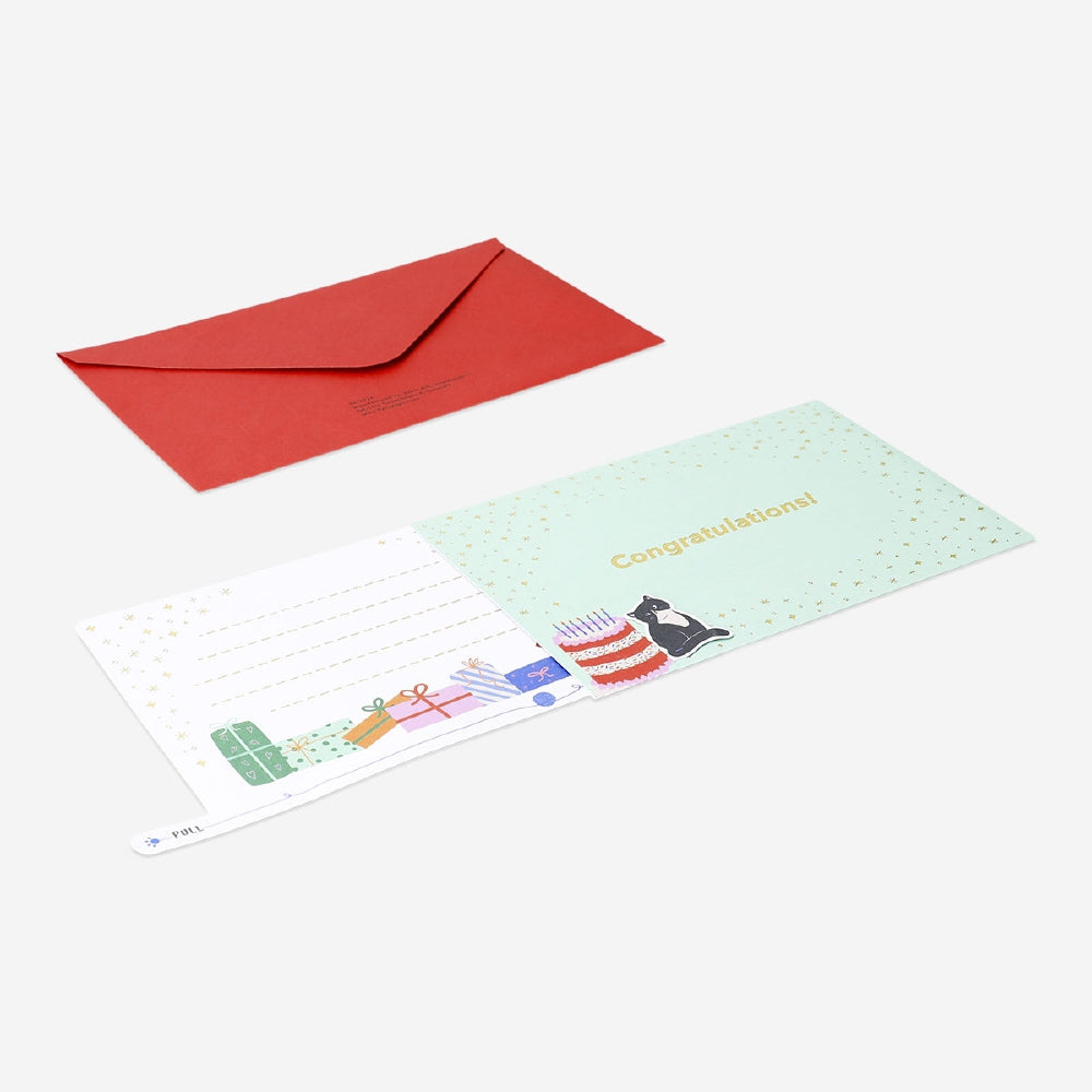 Flying Tiger Copenhagen birthday card featuring a cute cat with presents and a pull-out feature for festive greetings.