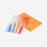 Funny candles birthday card from Flying Tiger Copenhagen featuring humorous candle illustrations on an office-themed greeting card.
