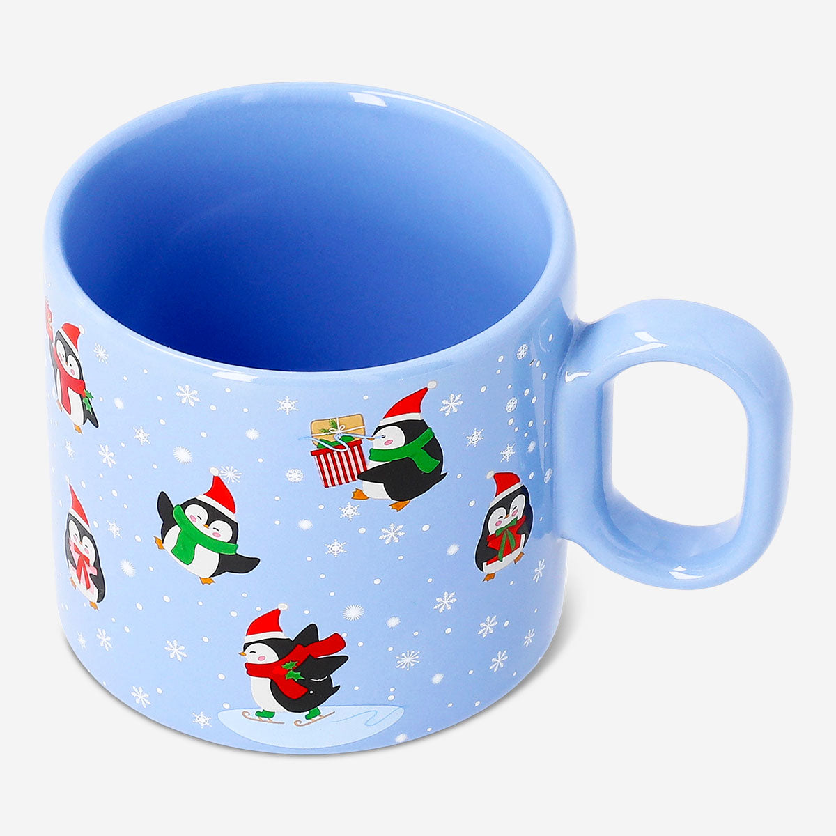 Flying Tiger Copenhagen 300ml penguin mug showing a white ceramic cup with playful penguin illustrations for kitchen use