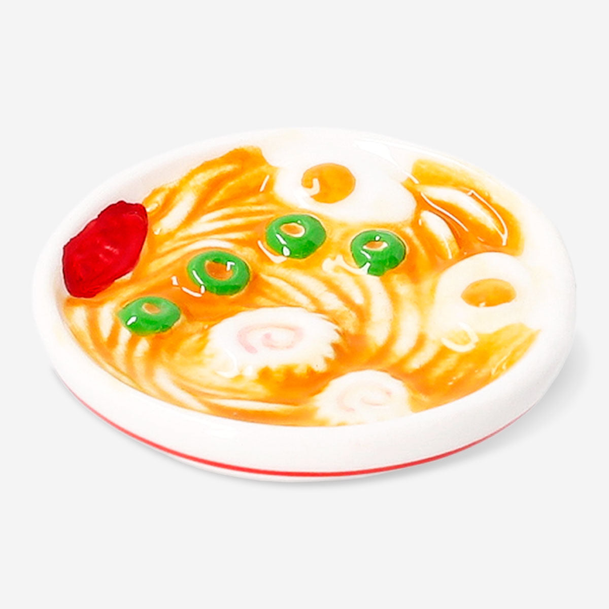 Flying Tiger Copenhagen ramen bowl with integrated chopstick holder, colorful ceramic kitchenware for Asian cuisine.