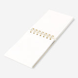 Spiral bound office notepad by Flying Tiger Copenhagen with lined pages for note-taking and organization.