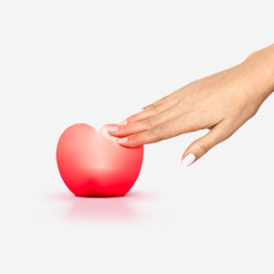 Red heart-shaped cozy lamp from Flying Tiger Copenhagen, perfect for warm home decor and ambient lighting.
