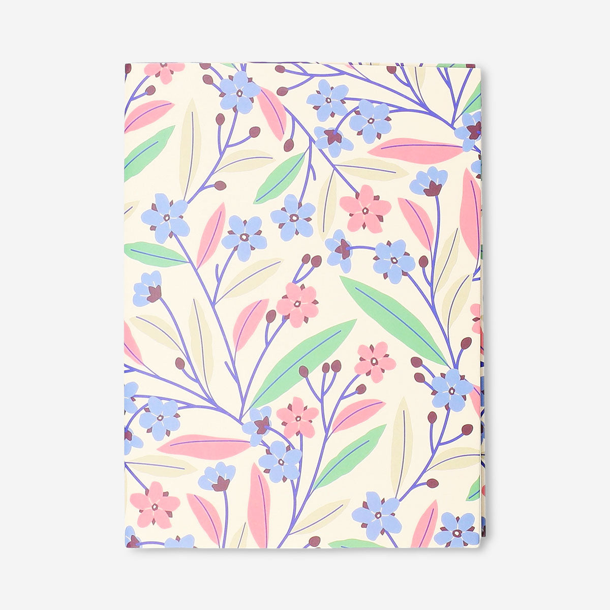 Floral office notebook by Flying Tiger Copenhagen with colorful flower pattern on the cover.