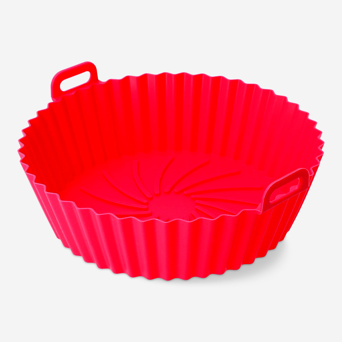 Round 20cm air fryer liner by Flying Tiger Copenhagen, non-stick kitchen accessory for easy cleaning and even cooking.