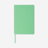 Green A5 bullet planner from Flying Tiger Copenhagen with an office design, featuring pages and organizational sections.