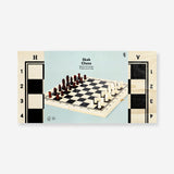 Wooden chess game by Flying Tiger Copenhagen featuring a classic chessboard with carved wooden chess pieces.