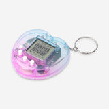 Digital pet keyring gadget from Flying Tiger Copenhagen featuring a colorful, interactive pet design on a compact keychain.