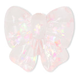 Pink fidget bow gadget from Flying Tiger Copenhagen, a press-me toy designed for stress relief and sensory play.