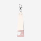 Flying Tiger Copenhagen media phone stand with key ring, featuring a compact design and practical accessory for holding phones.