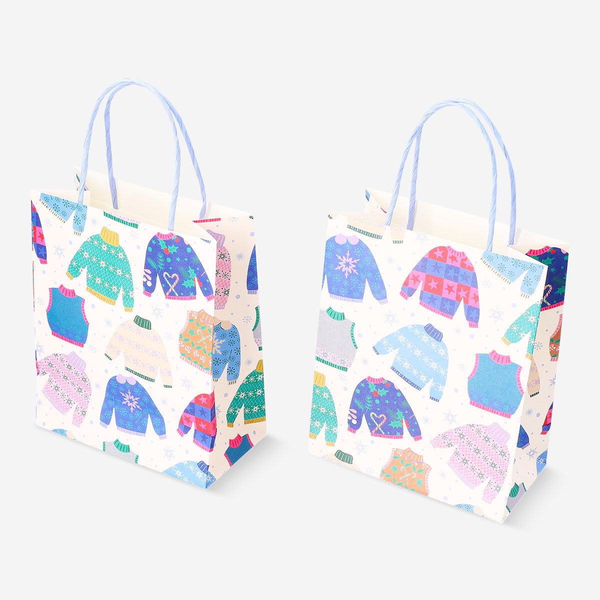 Two Flying Tiger Copenhagen snowflake gift bags for office gifts, featuring festive snowflake designs in a set of two.