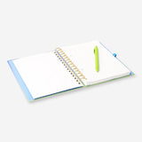 Flying Tiger Copenhagen A5 gradient notebook with matching pen and sticky memos on a desk scene