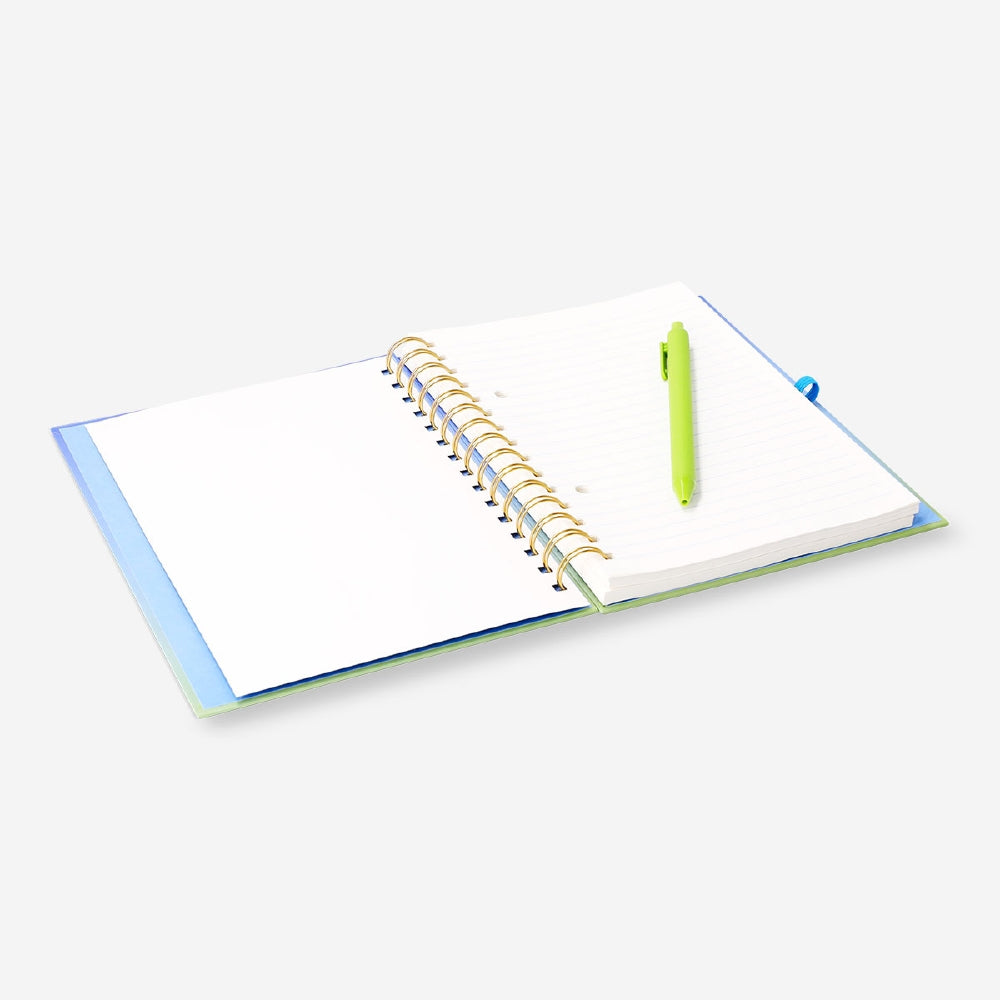Flying Tiger Copenhagen A5 gradient notebook with matching pen and sticky memos on a desk scene