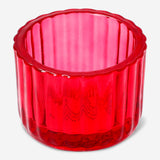 Pink glass tealight holder for home decor, featuring a smooth, rounded design from Flying Tiger Copenhagen.