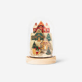 DIY wooden Christmas scene snowglobe by Flying Tiger Copenhagen, featuring miniature holiday figures and festive winter details.