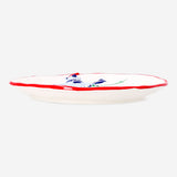 Round kitchen plate with embossed skiing polar bear design, 21 cm, by Flying Tiger Copenhagen, featuring winter-themed artwork.