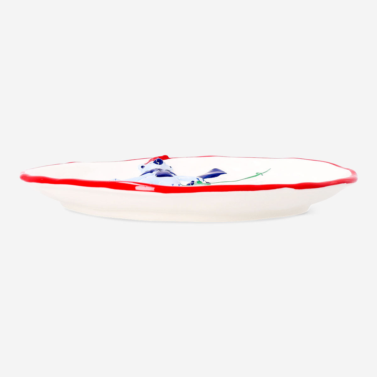 Round kitchen plate with embossed skiing polar bear design, 21 cm, by Flying Tiger Copenhagen, featuring winter-themed artwork.