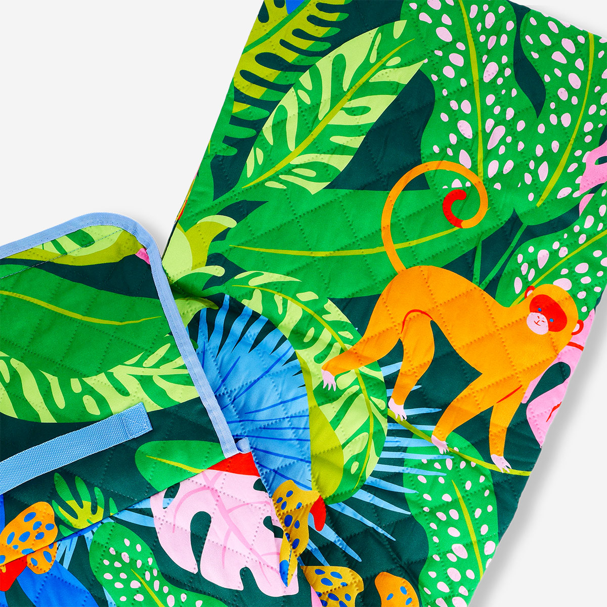 Flying Tiger Copenhagen tropical print picnic blanket with carrying strap, 170x90 cm, suitable for outdoor gatherings and picnics.