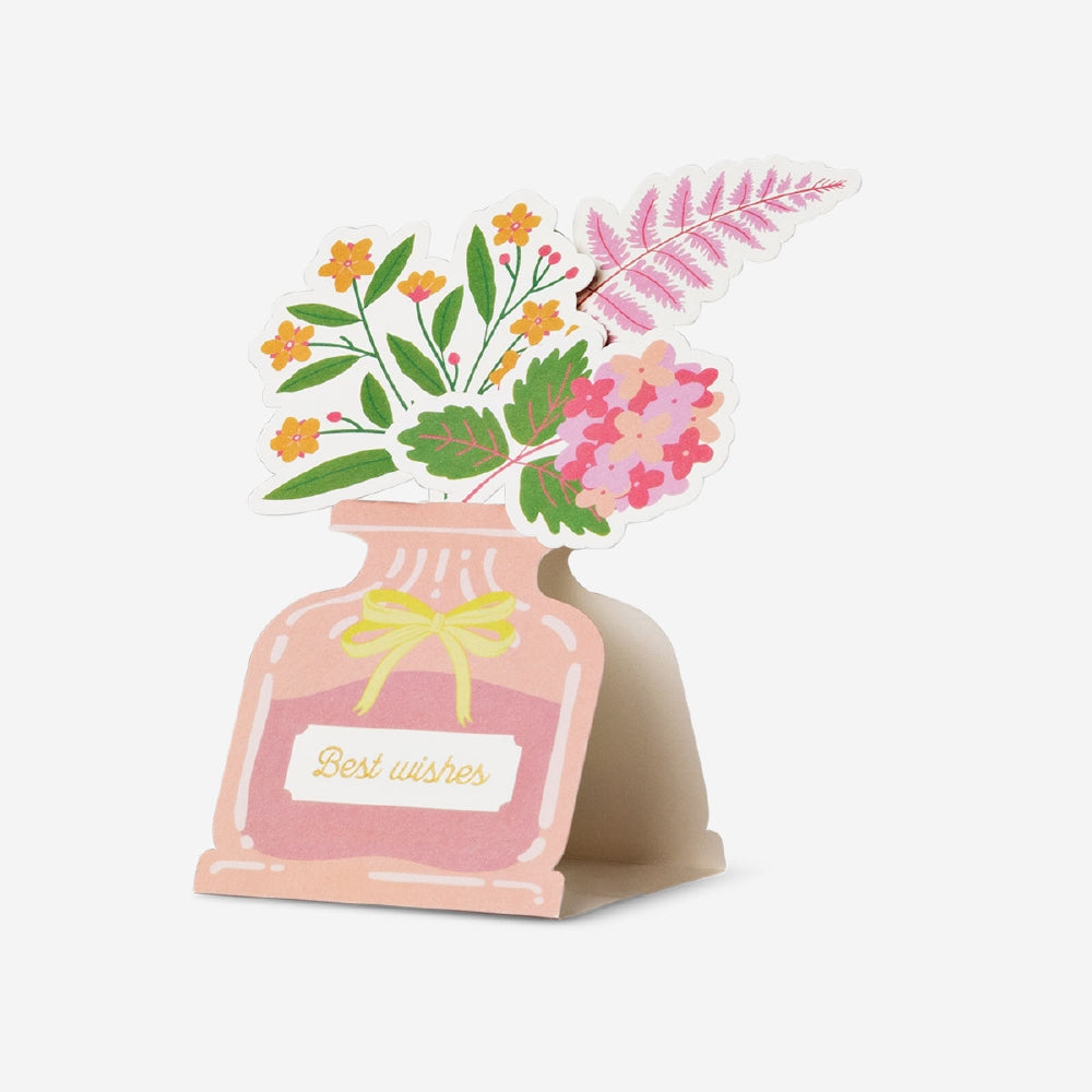 Office greetings card with floral vase design by Flying Tiger Copenhagen, featuring colorful flowers and a cheerful "Best wishes" message.