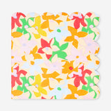 Set of 16 floral and scalloped edge party napkins by Flying Tiger Copenhagen, featuring colorful floral patterns.