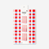 Set of three Flying Tiger Copenhagen gift bags with red checkered pattern, ideal for office presents or party favors.