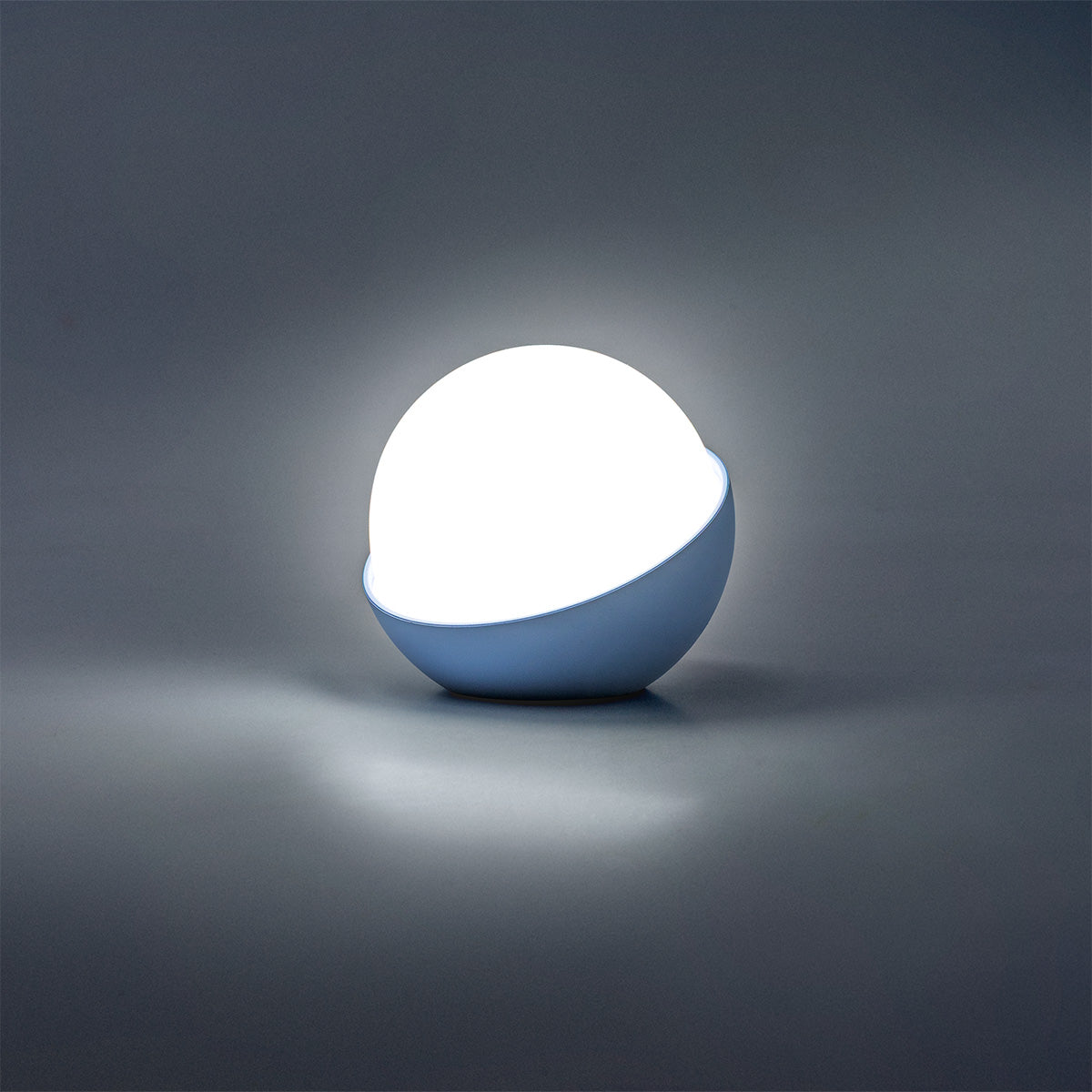 Blue globe-shaped cozy lamp by Flying Tiger Copenhagen, perfect for home decor and ambient lighting.